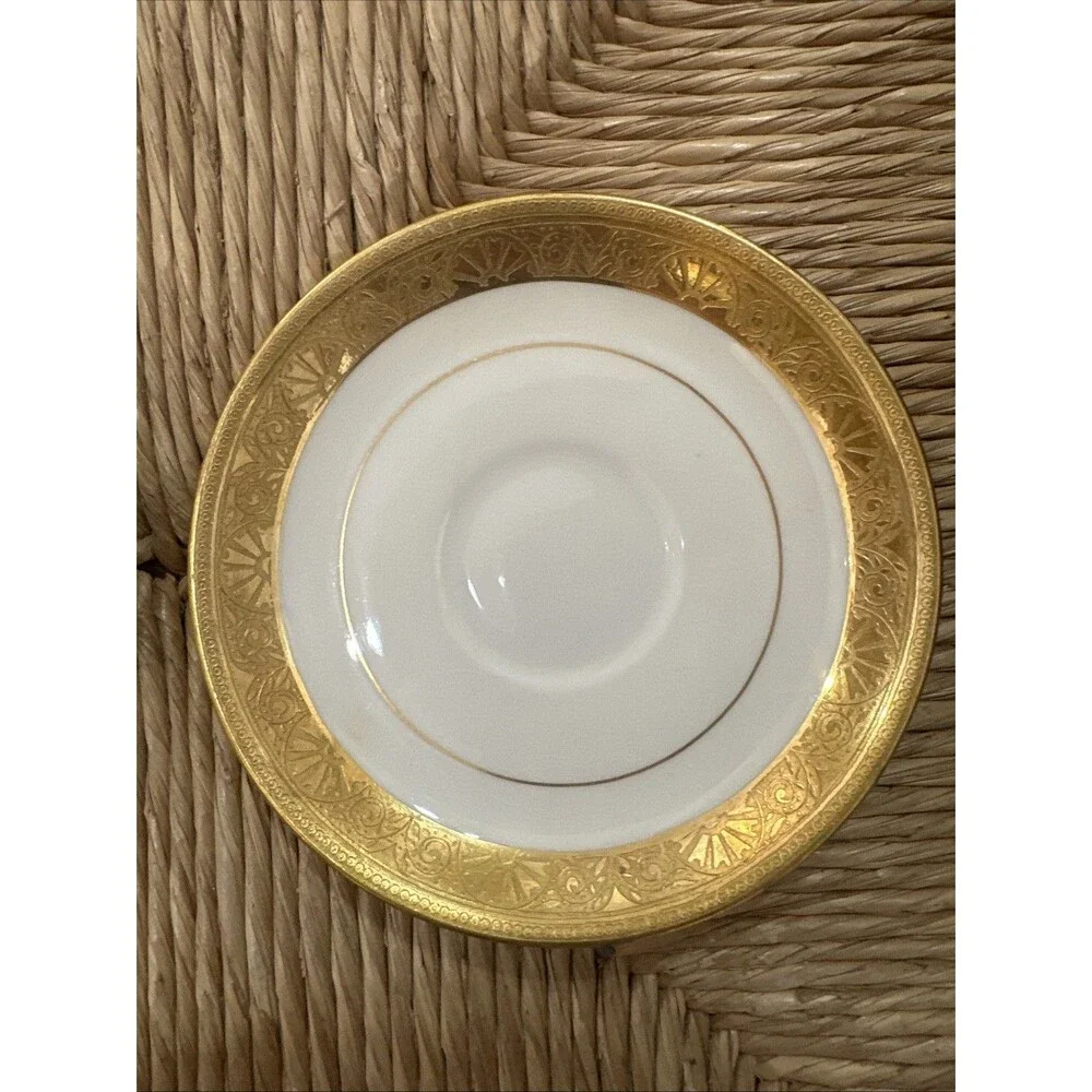 Minton for Tiffany & Co two gold rim White saucers